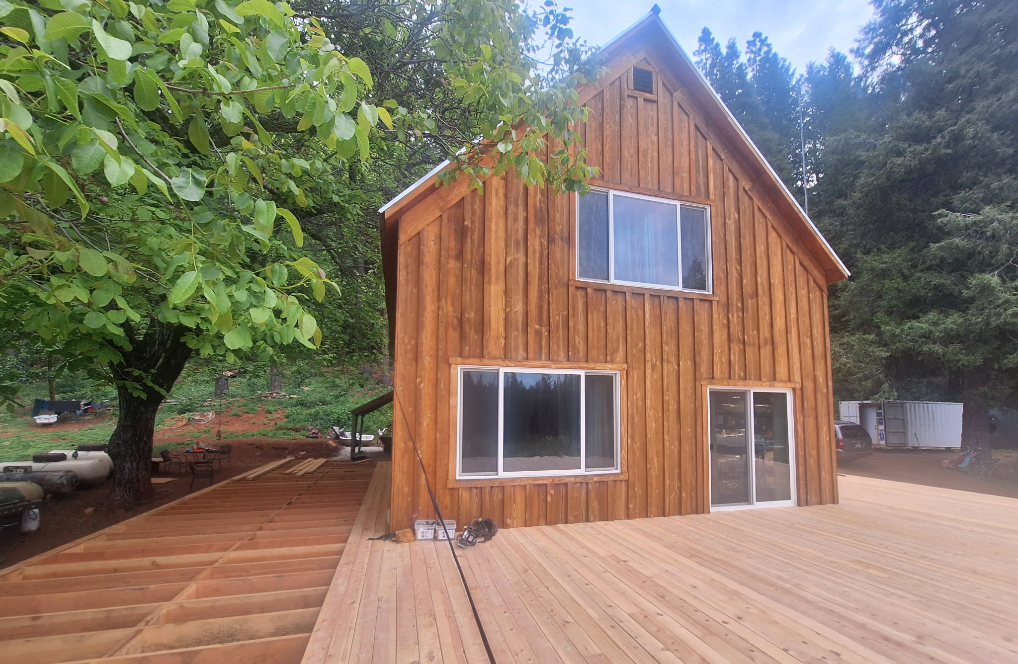 Home exterior finished with Sierra Custom Lumber siding and deck boards.